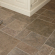 Removal of oil or wax from stone tiles